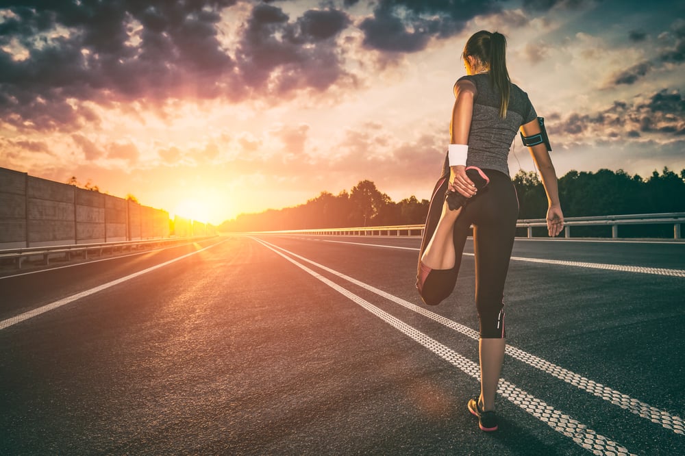 Female runner preparing to run