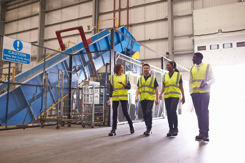 Staff walking in factory