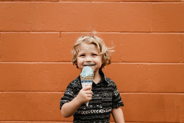 Little boy eating ice cream