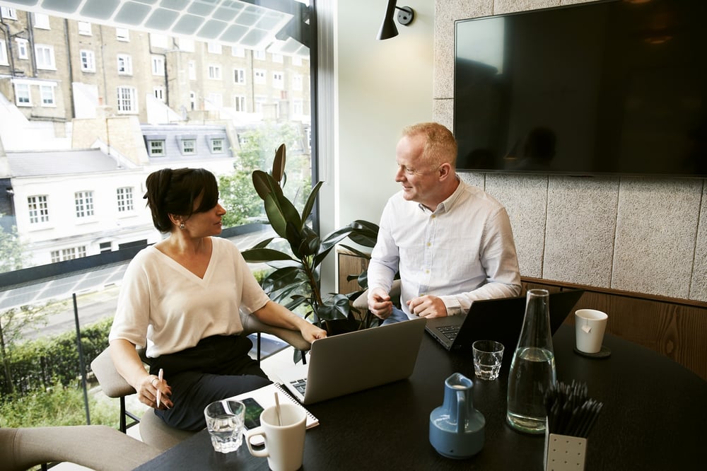 Man and woman having a business discussion