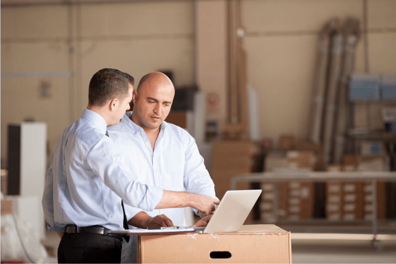 Copy of Meeting - Two businessmen with laptop in factory 1