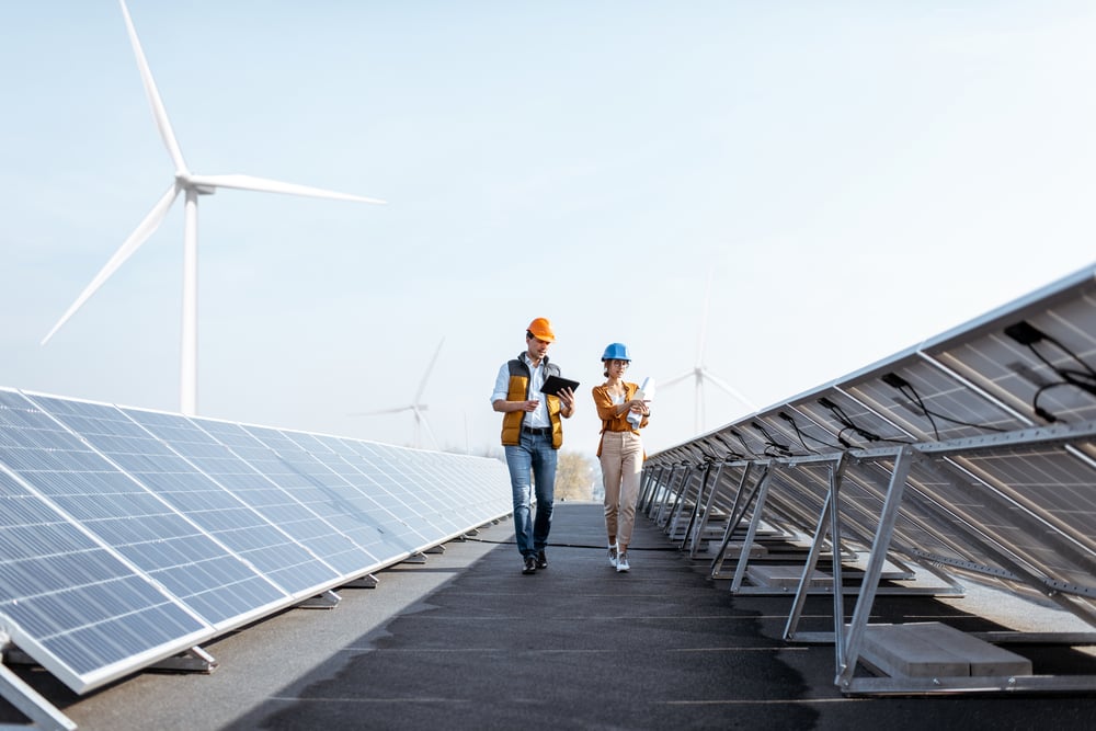 Two engineers with solar panels